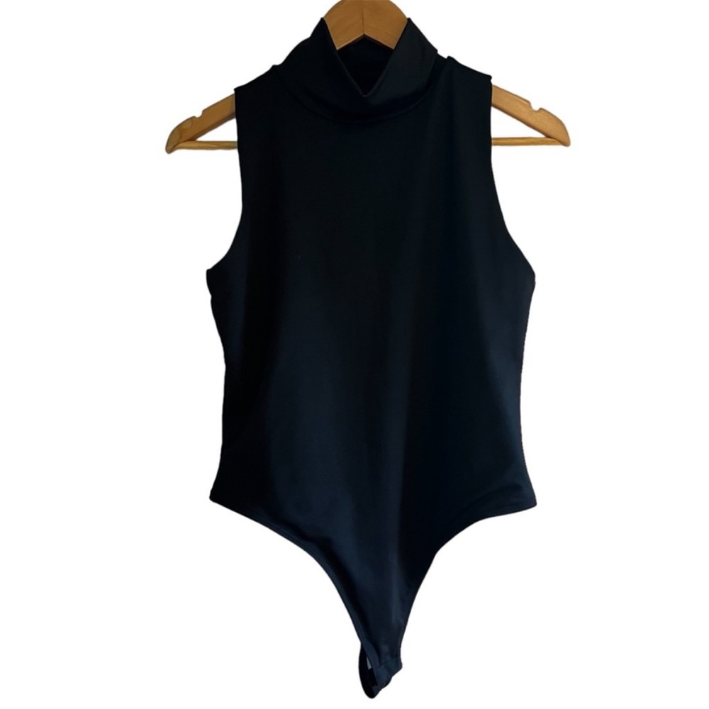 Smash & Tess sleeveless turtleneck black bodysuit snap closure